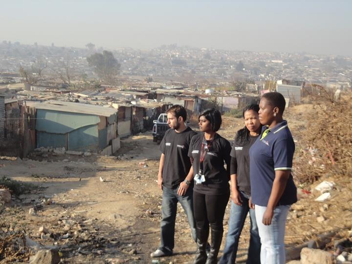 C2A team overlooking the Diepsloot community